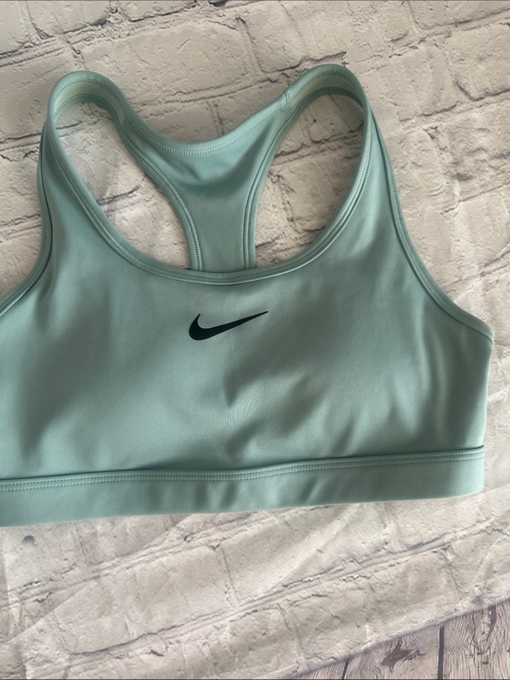 Nike Mint Green Racerback Sports Bra with Black Swoosh. Never worn size small